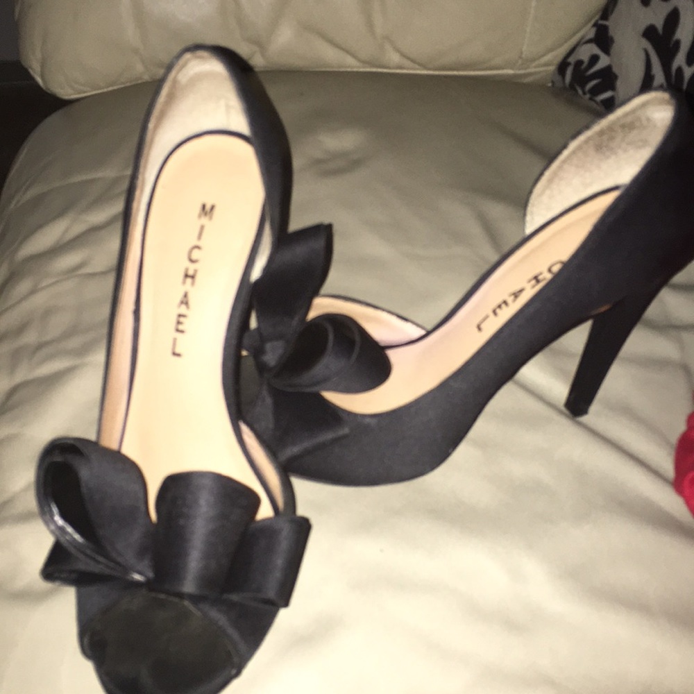 Black, satin, peep toe pump with bow